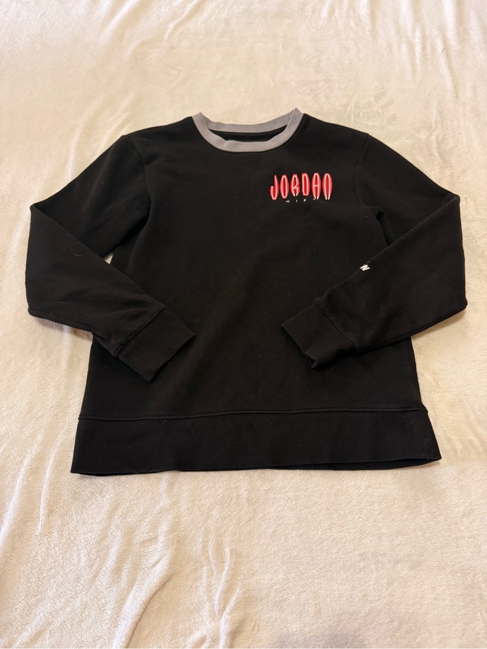 Nike Black Sweatshirt with Red Jordan Logo and Gray Neck Trim
